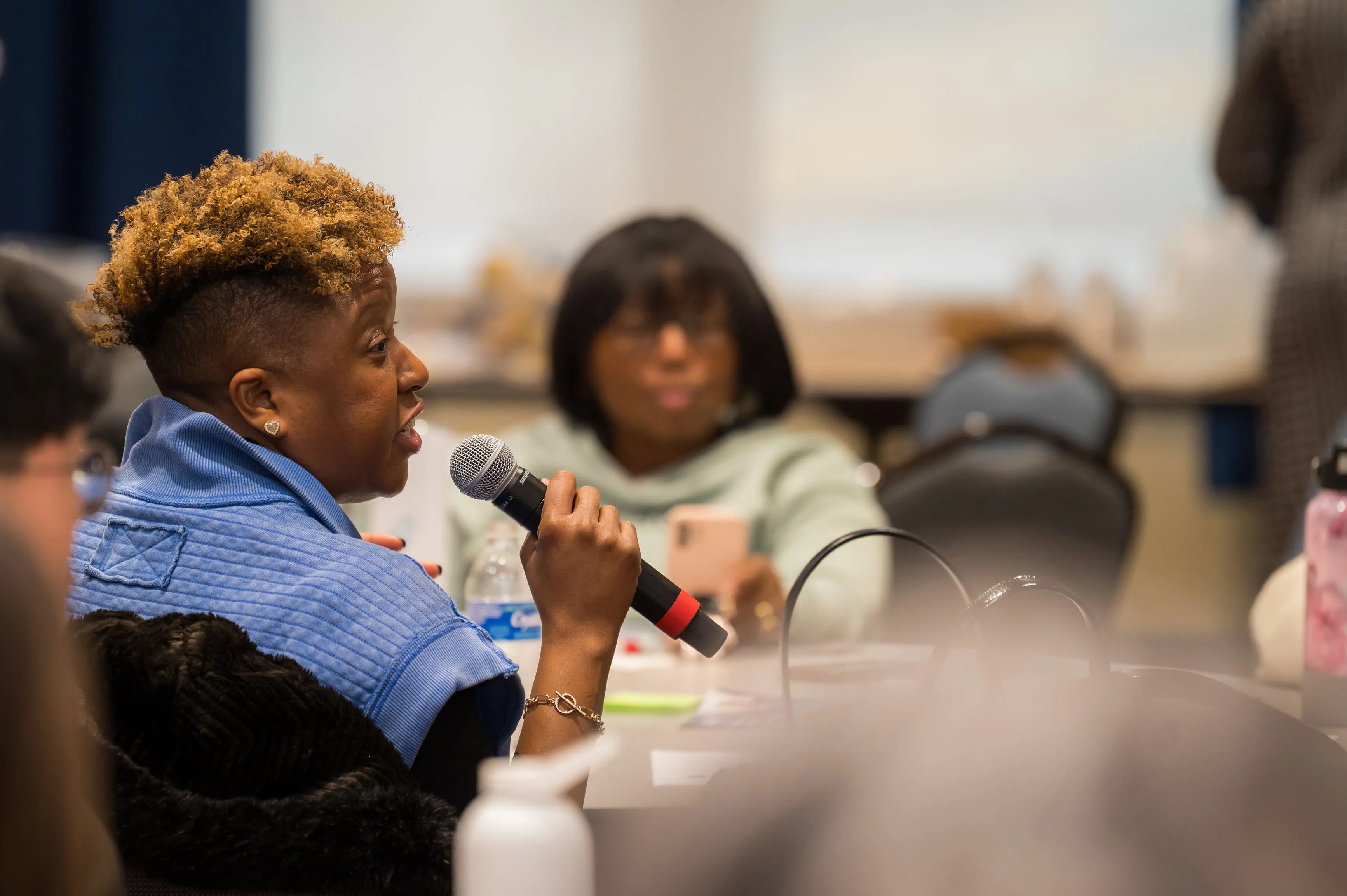 Racial healing day gathering with shared cultural practice.