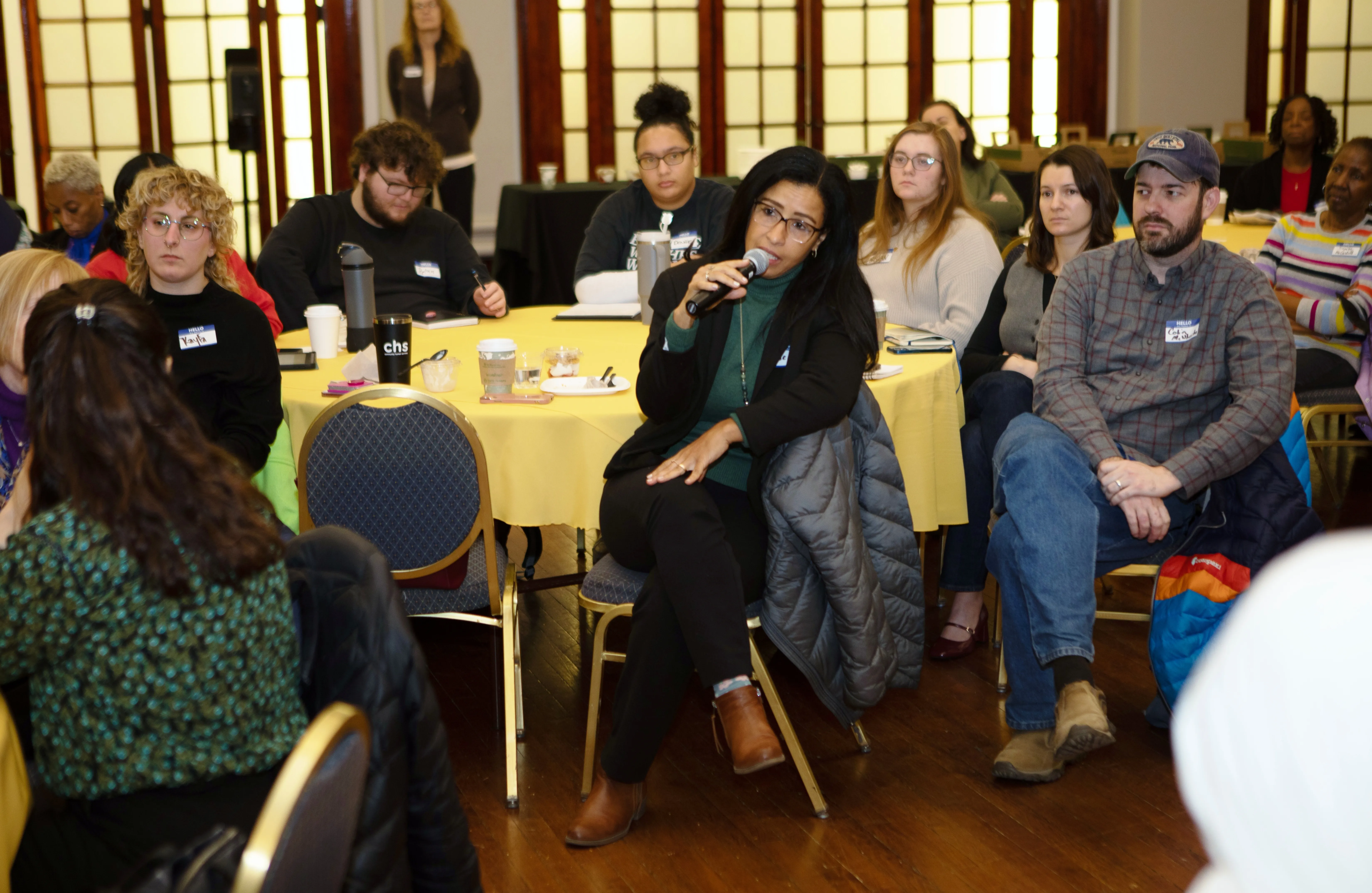 Public-facing health equity event in community space.